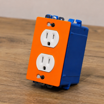 Orange and blue electrical outlet cover on a wooden surface