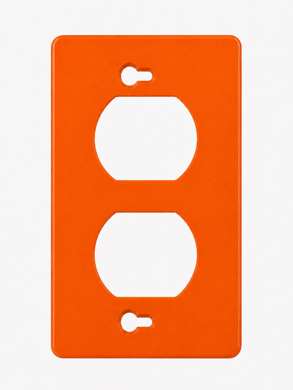 Orange wall plate with two white sockets on a white background